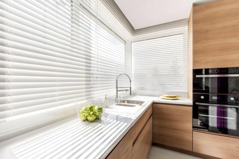 Faux wood blinds with warm natural tones