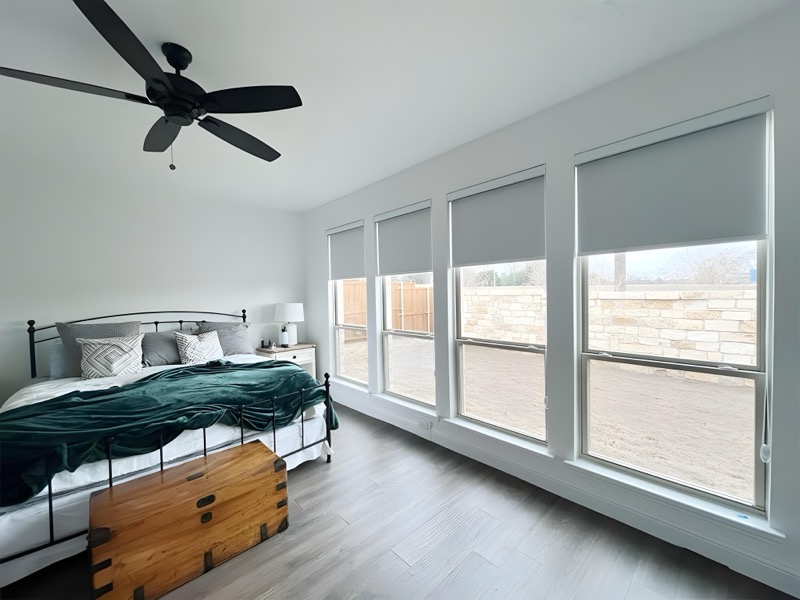 Motorized blackout shades in an Austin media room