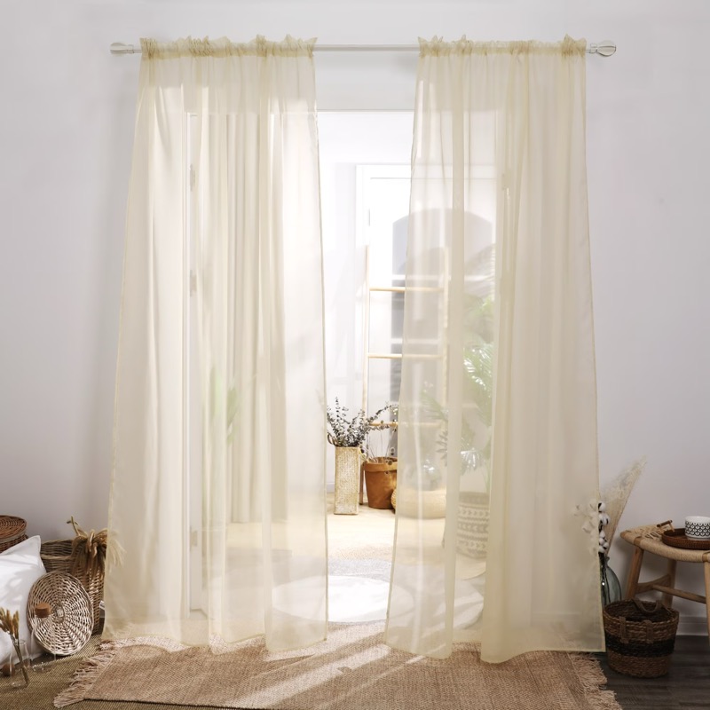 Sheer curtains filtering light with an airy feel