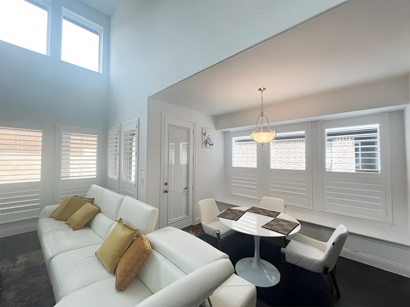 Plantation shutters in a sunlit living room