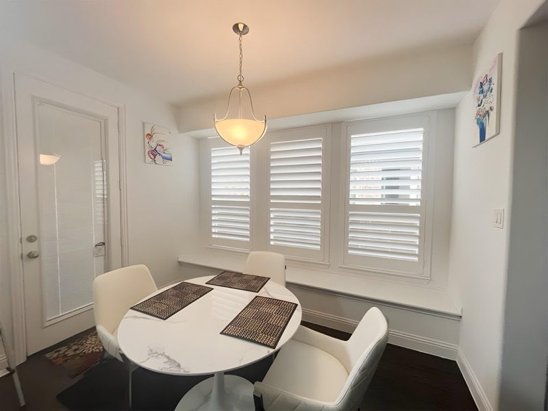 Shutters with wide louvers in a modern kitchen